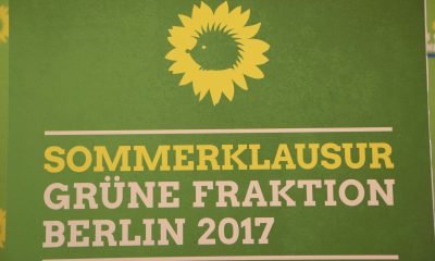 Im Bild ist das Logo der Grünen Sommerklausur zu sehen.